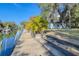 Steps lead down to waterfront canal access at 6119 Beacon Point Dr, Weeki Wachee, FL 34607