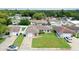 Residential aerial view of a single-story home with green lawn at 8922 Catalina Dr, Port Richey, FL 34668