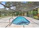 A screened-in pool with a waterfall feature at 1007 Lakewood Dr, Brandon, FL 33510