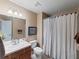 Clean bathroom with shower/tub combo and updated vanity at 10120 Post Harvest Dr, Riverview, FL 33578