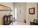 Bright entryway with decorative accents and tiled floor at 10120 Post Harvest Dr, Riverview, FL 33578