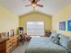 Large bedroom with vaulted ceilings, and a dresser at 10120 Post Harvest Dr, Riverview, FL 33578