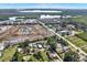 Scenic aerial view of a waterfront community, showcasing ongoing construction and stunning natural surroundings at 10455 14Th Ne St, St Petersburg, FL 33702