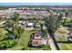 The aerial view shows a neighborhood undergoing development close to a residential area with waterfront views at 10455 14Th Ne St, St Petersburg, FL 33702