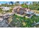 Exterior home elevation featuring a carport and gravel yard at 10455 14Th Ne St, St Petersburg, FL 33702