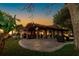 Outdoor patio featuring a pergola, outdoor furniture and stamped concrete at sunset at 10532 94Th Pl, Seminole, FL 33772