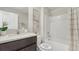 Clean bathroom with tub and vanity at 10596 Farm Hill Ave, Land O Lakes, FL 34638