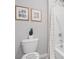 Simple bathroom with a tub shower combo and updated fixtures at 10596 Farm Hill Ave, Land O Lakes, FL 34638