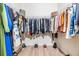 Large walk-in closet with ample hanging space and shelving at 11976 Brighton Knoll Loop, Riverview, FL 33579