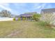 Large backyard with screened pool and fenced perimeter at 12705 Bramfield Dr, Riverview, FL 33579