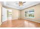 Bedroom with pool view and access to kitchen at 12705 Bramfield Dr, Riverview, FL 33579