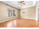 Bright bedroom with wood flooring and large window at 12705 Bramfield Dr, Riverview, FL 33579