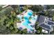 Community pool with surrounding lush landscape at 12705 Bramfield Dr, Riverview, FL 33579