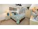 Bright bedroom with a queen bed and plenty of closet space at 14130 Rosemary Ln # 3204, Largo, FL 33774