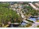 Aerial view of the Waterchase community showcasing lakes, landscaping, community entrance, and amenities at 14607 Turning Leaf Ct, Tampa, FL 33626