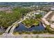 Aerial view of the beautiful Waterchase community, showcasing lakes, lush landscaping, and amenities at 14607 Turning Leaf Ct, Tampa, FL 33626