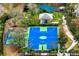 Aerial view of a blue and green basketball court and playground at 14607 Turning Leaf Ct, Tampa, FL 33626