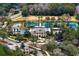 Aerial view of the Waterchase community amenities, including pool, tennis courts, clubhouse, and landscaping at 14607 Turning Leaf Ct, Tampa, FL 33626