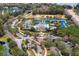 Aerial view of the Waterchase community amenities, including pool, tennis courts, and clubhouse at 14607 Turning Leaf Ct, Tampa, FL 33626