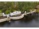 Aerial shot of the Waterchase community entrance, showcasing the water feature and lush landscaping at 14607 Turning Leaf Ct, Tampa, FL 33626