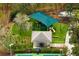 Aerial view of a community playground with swings and slides at 14607 Turning Leaf Ct, Tampa, FL 33626