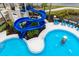 The large blue water slide and connecting pool provide hours of fun for the whole Gathering at 14607 Turning Leaf Ct, Tampa, FL 33626