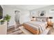 Bedroom with natural light, wood-look floors, and tastefully coordinated decor at 15422 Wine Dr, Weeki Wachee, FL 34614