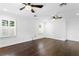 Spacious bedroom with hardwood floors and ceiling fans at 156 29Th N Ave, St Petersburg, FL 33704