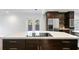 Granite kitchen island with cooktop and ample storage at 156 29Th N Ave, St Petersburg, FL 33704