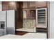 Kitchen features stainless steel appliances and wine cooler at 156 29Th N Ave, St Petersburg, FL 33704