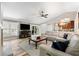 Cozy living room with tile flooring and a view of the pool at 16908 Equestrian Trl, Odessa, FL 33556