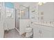 Modern bathroom featuring a glass shower, a white vanity, and contemporary fixtures, offering a spa-like experience at 192 Haven Beach Dr, Indian Rocks Beach, FL 33785