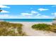 This is a scenic beach access point, with a sandy path leading to a tranquil beachfront at 192 Haven Beach Dr, Indian Rocks Beach, FL 33785