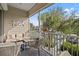 Relaxing screened balcony boasts comfortable seating and serene views of the surrounding community at 192 Haven Beach Dr, Indian Rocks Beach, FL 33785