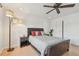 Spacious bedroom with a ceiling fan and a comfortable queen-sized bed at 205 S Mcmullen Booth Rd # 202, Clearwater, FL 33759