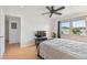 Inviting bedroom with natural light and a television for entertainment at 205 S Mcmullen Booth Rd # 202, Clearwater, FL 33759