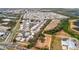 Drone's view of the community with a road winding through the homes, plus solar panels at 206 S Port Royal Ln, Apollo Beach, FL 33572