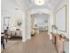 Open-concept foyer showcasing hardwood floors and seamless transition to the living areas at 2810 W Alline Ave, Tampa, FL 33611