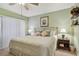 Serene bedroom with a queen bed, soft lighting, and calming color palette at 301 Mariner Dr # 301, Tarpon Springs, FL 34689