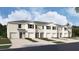 New townhome community with attached garages, and modern design at 31273 Midnight Sun Way, Wesley Chapel, FL 33545