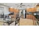 Spacious eat-in kitchen boasts stainless steel appliances and warm cabinetry at 315 Linger Ln, Sun City Center, FL 33573