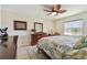 Serene main bedroom with warm tones, decorative accents, and comfortable furnishings at 315 Linger Ln, Sun City Center, FL 33573