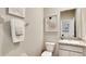 Small half bathroom with granite countertop and neutral-toned decor at 3426 Hazel Hollow Way, Plant City, FL 33565