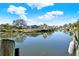 Captivating view of a peaceful canal with boats and lush greenery at 4346 Marine Pkwy, New Port Richey, FL 34652