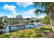 Private dock with calm waters and neighboring waterfront properties at 4346 Marine Pkwy, New Port Richey, FL 34652