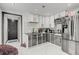 Modern gray and white kitchen with stainless steel appliances at 4408 W Minnehaha St, Tampa, FL 33614