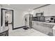 Modern kitchen with gray cabinets and marble floor at 4408 W Minnehaha St, Tampa, FL 33614