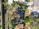 Overhead aerial view of the property showcasing the landscaped yard, driveway, and mature trees at 4532 W Beachway Dr, Tampa, FL 33609