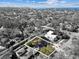 Aerial view of the property highlighting the home's location with water views beyond the neighborhood at 4532 W Beachway Dr, Tampa, FL 33609