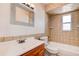 Bathroom featuring tiled shower, tub, and vanity at 4570 69Th N Ave, Pinellas Park, FL 33781